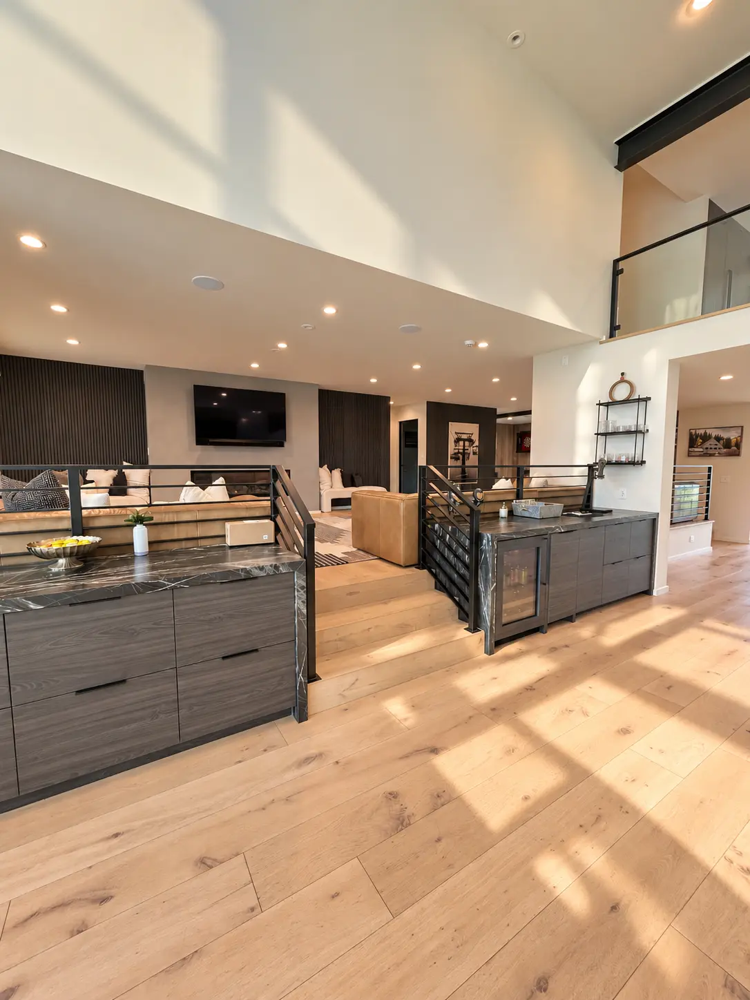 Custom millwork, stone-topped built-ins, and steel railings